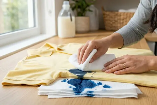 blot the excess ink without spreading the stain